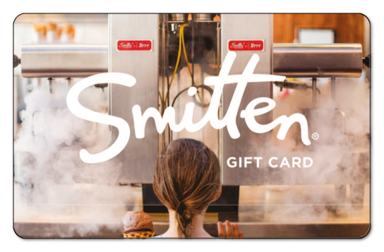 smitten white text logo on a background of a woman cooking in the kitchen